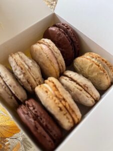 Box of neutral colored macarons