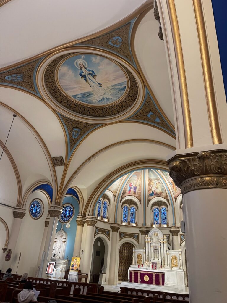 Ceiling of Catholic Church with murals dedicated to Virgin Mary