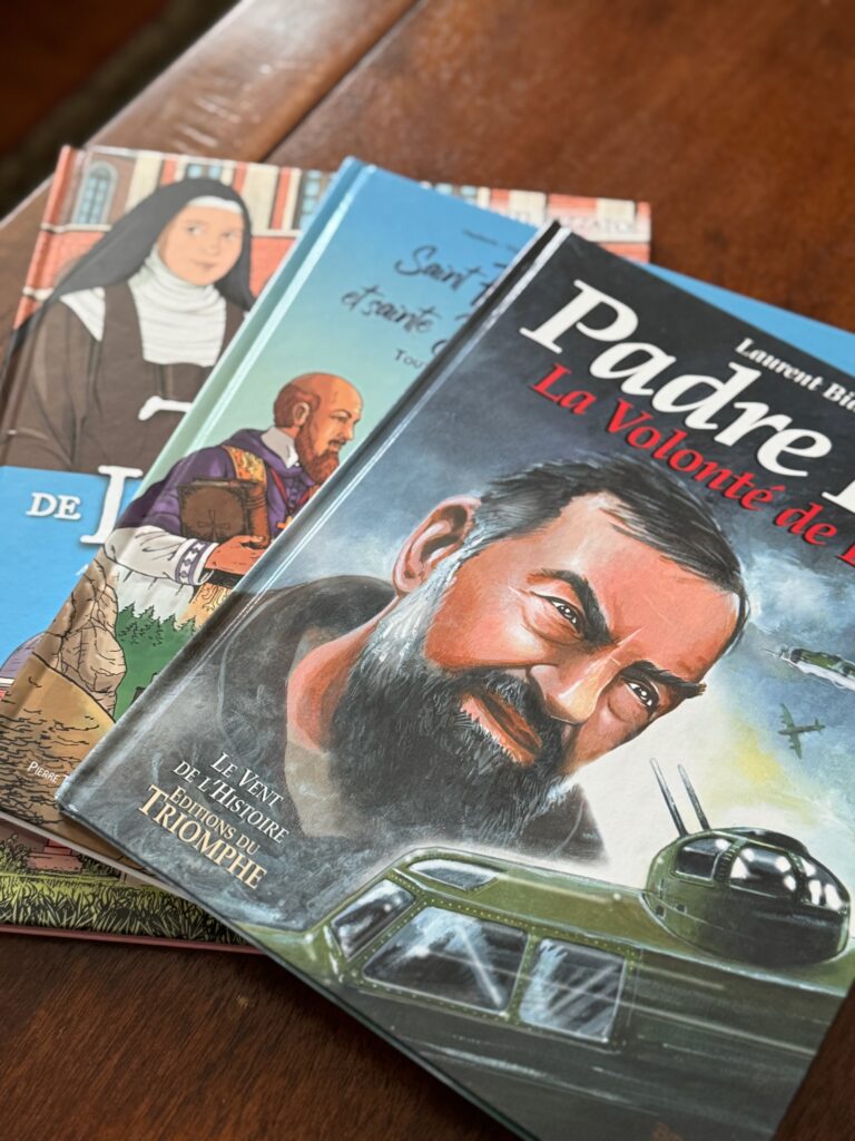 Stack of children's books about saints