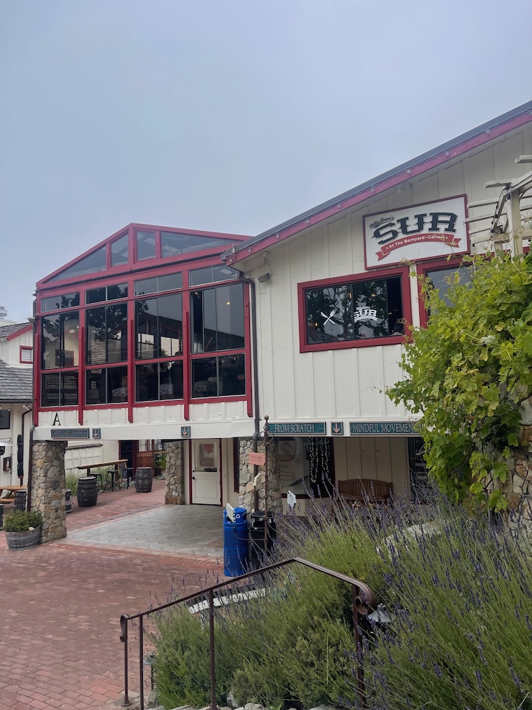The exterior of Sur at the Barnyard restaurant that sits on the second floor with a barnyard style