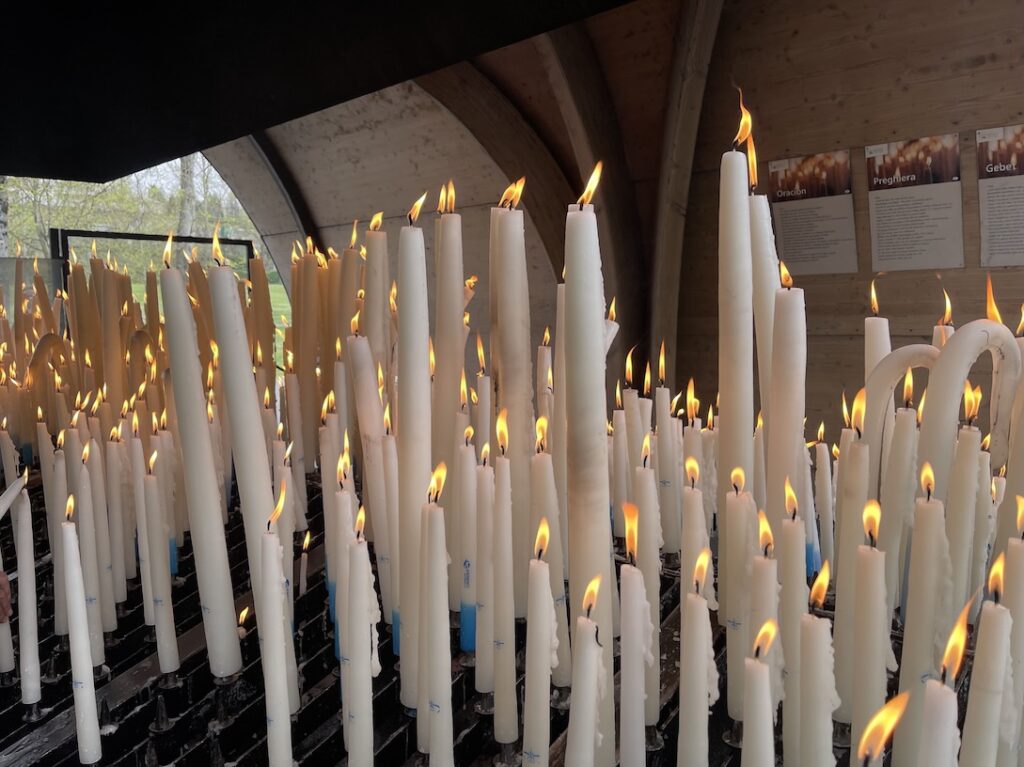 Candles of various sizes offered at the Sanctuary of Our Lady of Lourdes in the Chapel of Lights which is the spot dedicated to offering candles