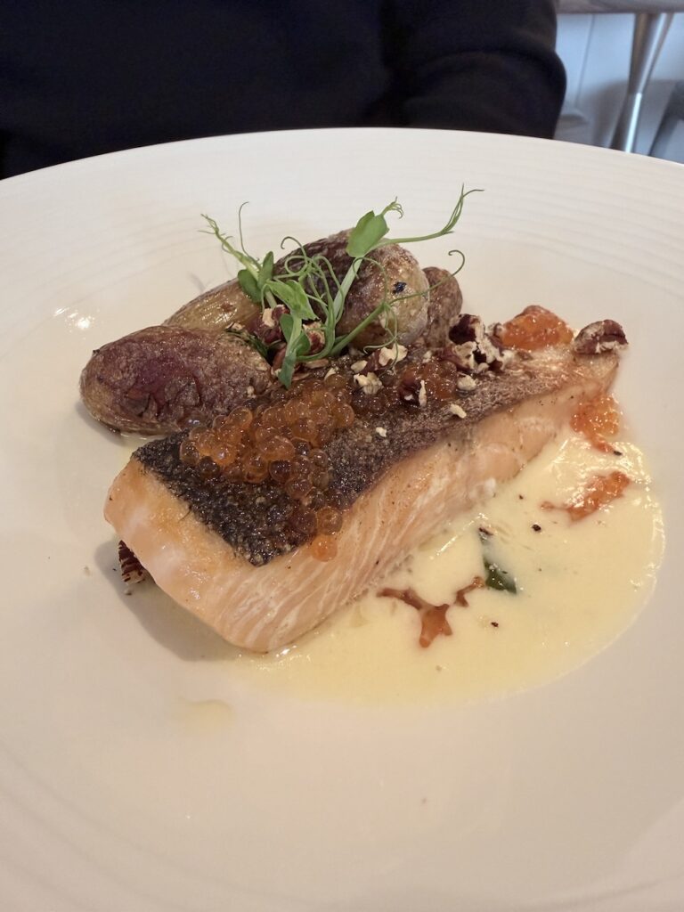 Pan-seared salmon with roe and creamy sauce at Epona restaurant Lyon modern French gastronomy