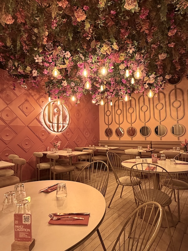 Stylish pink floral ceiling dining room at Litani Mezza Bar Lyon modern Middle Eastern restaurant