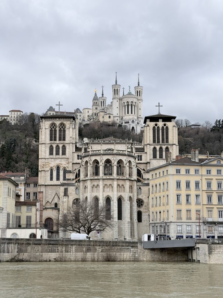 Cathédrale Saint-Jean-Baptiste in Lyon’s Old Town with Basilica of Notre-Dame de Fourvière above on Fourvière hill.