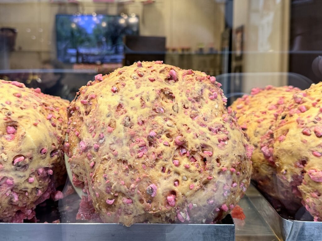 Iconic Lyon praluline brioche with pink pralines at Pralus bakery Lyon France specialty pastry