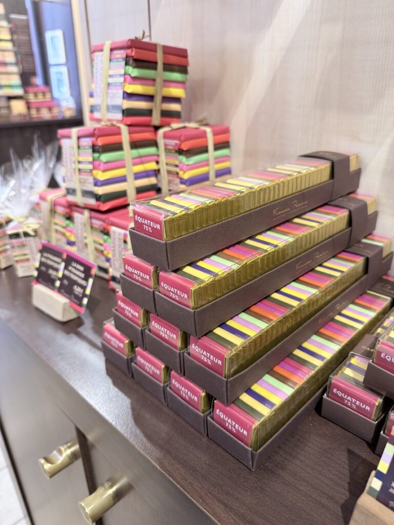 Colorful François Pralus chocolate bars display in Lyon artisan chocolatier boutique